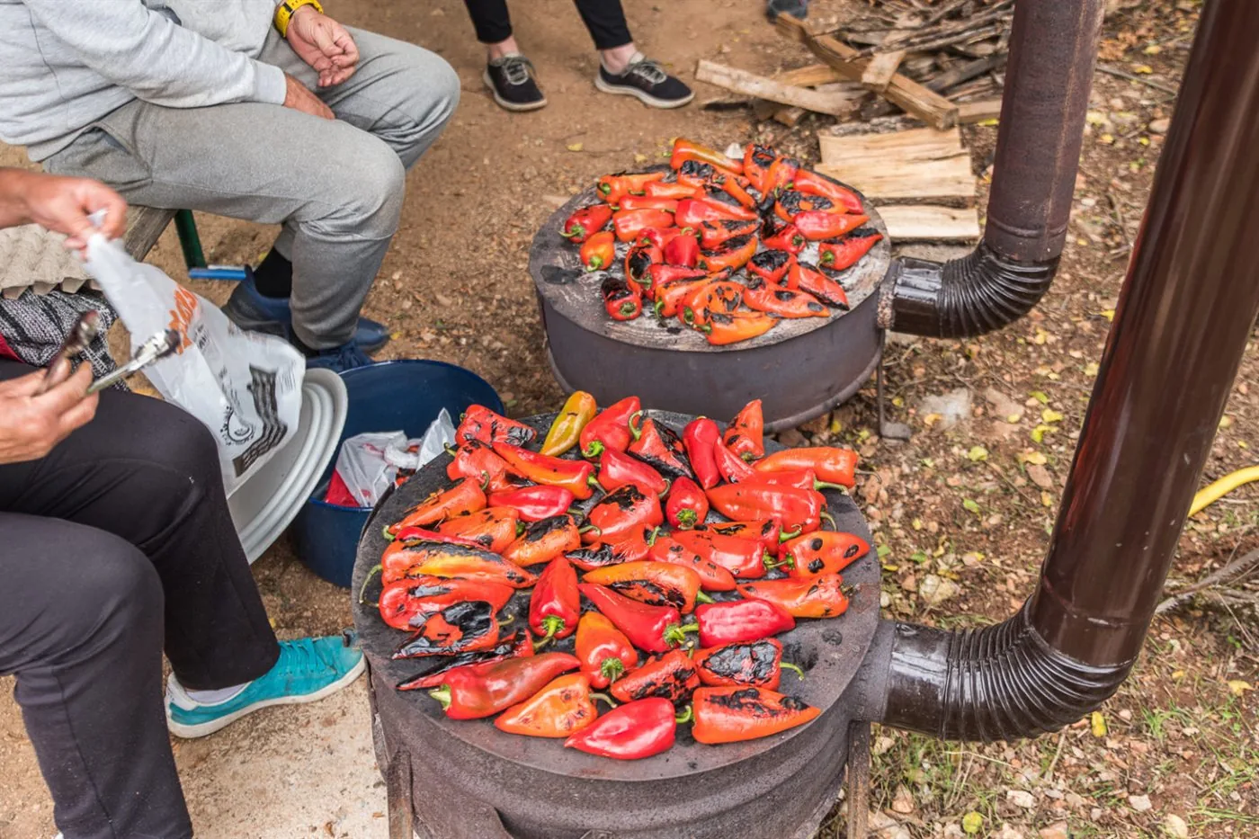 Roasted red peppers being prepared for homemade ajvar