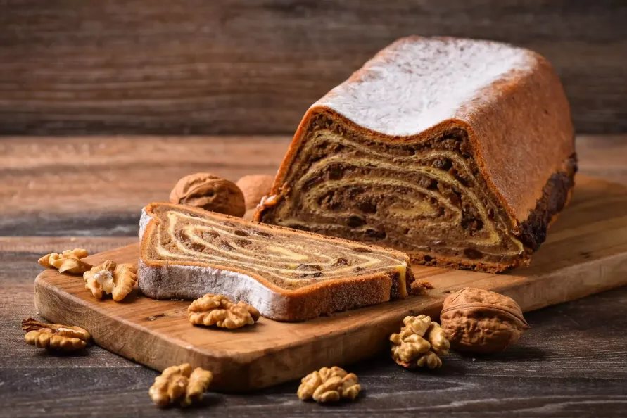 Sliced walnut potica baked in a traditional round mould